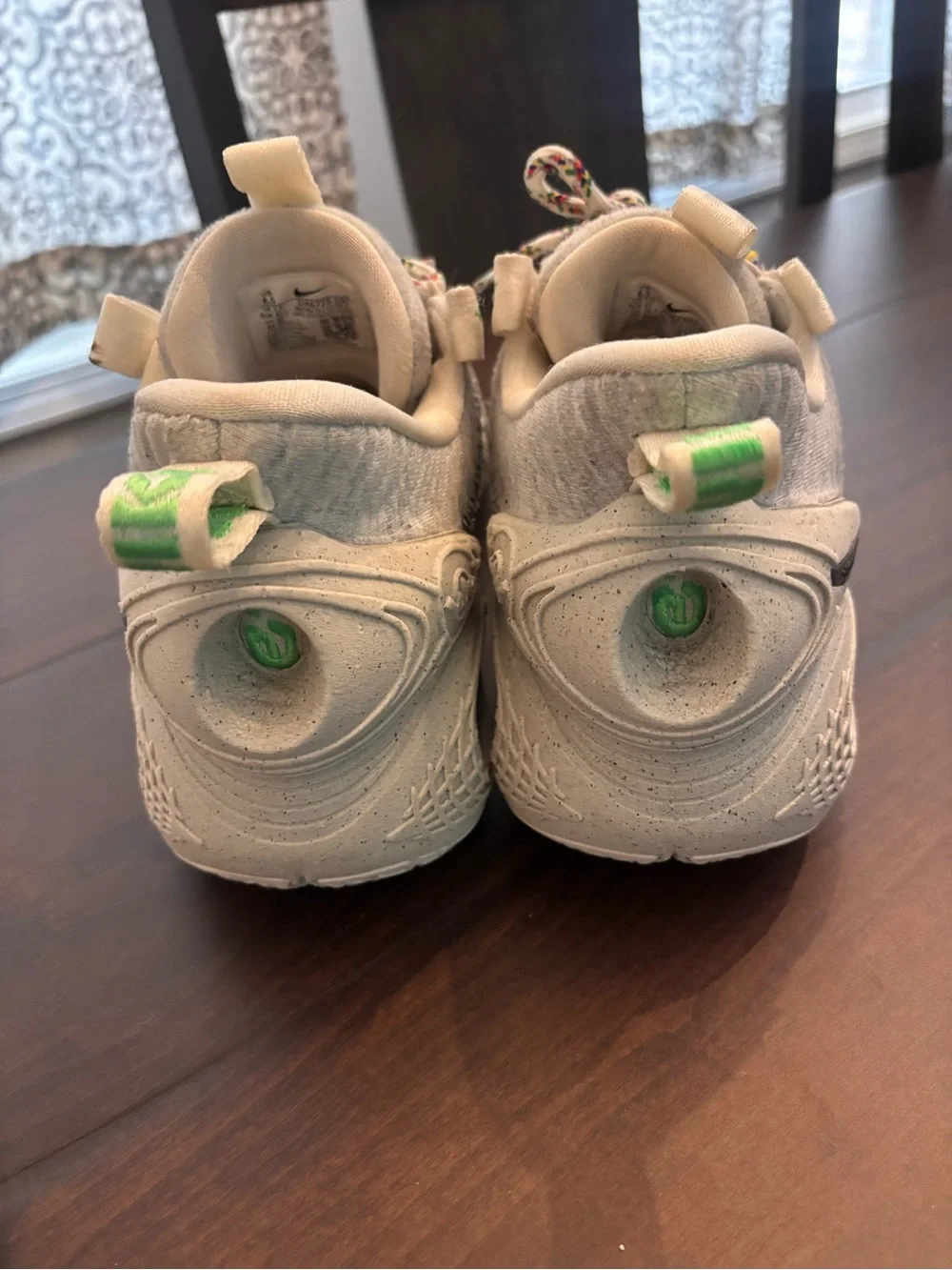 Nike Cosmic Unity Cream and Black Running Shoes